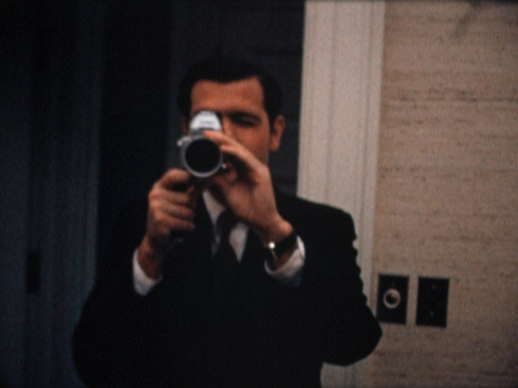 Special Assistant Dwight Chapin films Haldeman filming him at the White House on the night of the Apollo 11 moon landing (July 20, 1969)