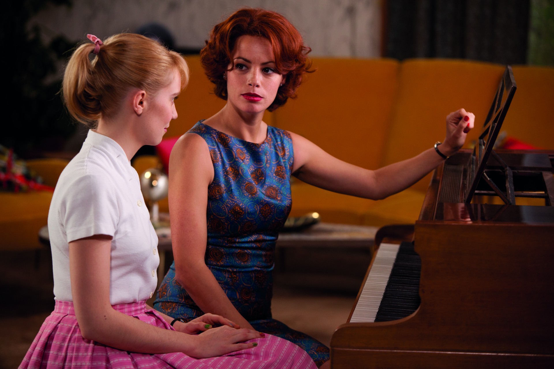 Deborah Francois stars as Rose Pamphyle and Berenice Bejo stars as Marie Taylor in The Weinstein Company's Populaire (2013)
