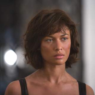 Camille (OLGA KURYLENKO) returns to the Grand Hotel Bolivia after her ordeal at the hands of Greene. Location: Casco Viejo, Panama City, Panama. Photo by: Karen Ballard.