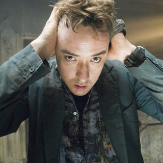 John Cusack as Mike Enslin in Dimension Films' 1408 (2007)