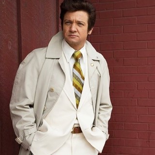 Jeremy Renner stars as Carmine Polito in Columbia Pictures' American Hustle (2013)