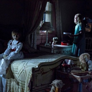 The Annabelle doll and Talitha Bateman (Janice) in Warner Bros. Pictures' Annabelle: Creation (2017)