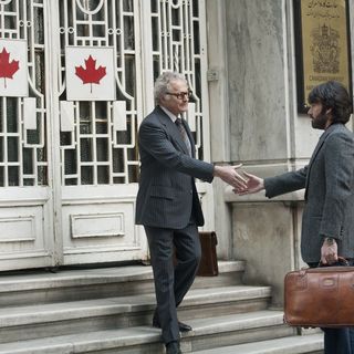 Victor Garber stars as Ken Taylor and Ben Affleck stars as Tony Mendez in Warner Bros. Pictures' Argo (2012)