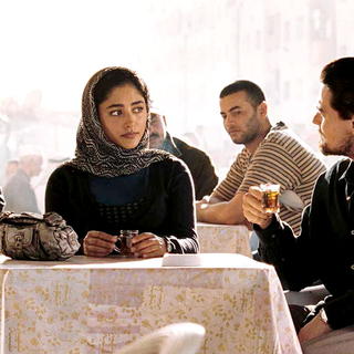 Golshifteh Farahani stars as Aisha and Leonardo DiCaprio stars as Roger Ferris in Warner Bros. Pictures' Body of Lies (2008)