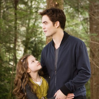 Mackenzie Foy stars as Renesmee and Robert Pattinson stars as Edward Cullen in Summit Entertainment's The Twilight Saga's Breaking Dawn Part II (2012)