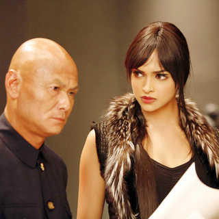 Gordon Liu stars as Hojo and Deepika Padukone stars as Meow Meow in Warner Bros. Pictures' Chandni Chowk to China (2009). Photo credit by Sheena Sippy.