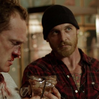 Pat Healy stars as Craig and  Ethan Embry stars as Vince in Drafthouse Films' Cheap Thrills (2014)