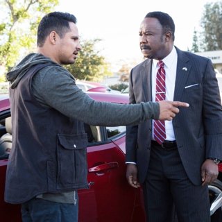 Michael Pena stars as Frank 'Ponch' Poncherello and Isiah Whitlock Jr. stars as Peterson in Warner Bros. Pictures' CHiPs (2017)