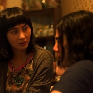 Josie Ho stars as Li Fai's Sister and Tien You Chui stars as Li Fai in Warner Bros. Pictures' Contagion (2011)