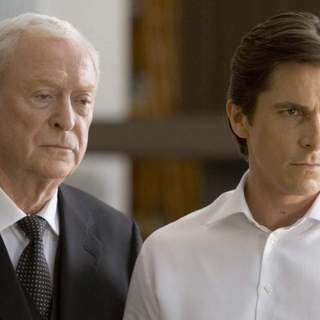 MICHAEL CAINE stars as Alfred Pennyworth and CHRISTIAN BALE stars as Bruce Wayne in Warner Bros. Pictures' and Legendary Pictures' action drama 