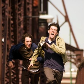 Jacob Zachar stars as Abe and  Zach Gray stars as Boy on Bike in Seven Arts' Drunkboat (2012)