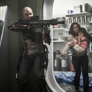 Matt Damon (stars as Max) and Alice Braga in TriStar Pictures' Elysium (2013)