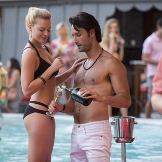 Margot Robbie stars as Jess Barrett and Rodrigo Santoro stars as Garriga in Warner Bros. Pictures' Focus (2015)