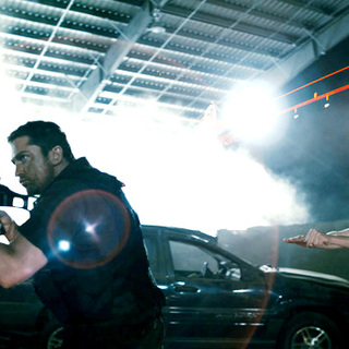 Gerard Butler stars as Kable and Logan Lerman stars as Simon in Lionsgate Films' Gamer (2009)