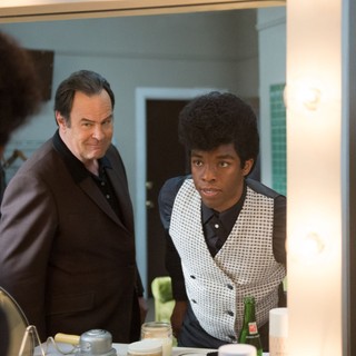 Dan Aykroyd stars as Ben Bart and Chadwick Boseman stars as James Brown in Universal Pictures' Get on Up (2014)