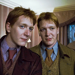 James Phelps stars as Fred Weasley and Oliver Phelps stars as George Weasley in Warner Bros. Pictures' Harry Potter and the Deathly Hallows: Part I (2010)