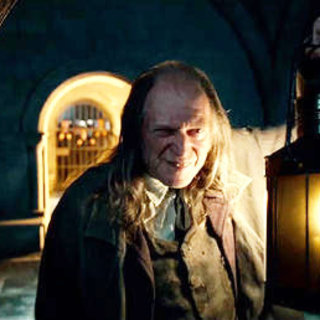 David Bradley stars as Argus Filch in Warner Bros. Pictures' Harry Potter and the Deathly Hallows: Part I (2010)
