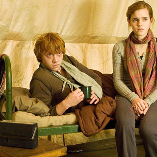 Rupert Grint stars as Ron Weasley and Emma Watson stars as Hermione Granger in Warner Bros. Pictures' Harry Potter and the Deathly Hallows: Part I (2010)