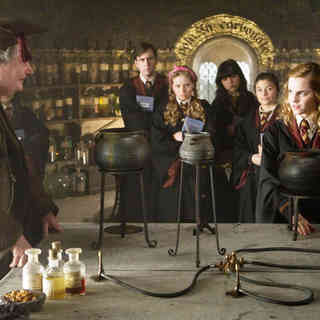 Jim Broadbent stars as Horace Slughorn and Emma Watson stars as Hermione Granger in Warner Bros Pictures' Harry Potter and the Half-Blood Prince (2009)