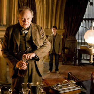 Jim Broadbent stars as Horace Slughorn and Daniel Radcliffe stars as Harry Potter in Warner Bros Pictures' Harry Potter and the Half-Blood Prince (2009)