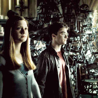 Bonnie Wright stars as Ginny Weasley and Daniel Radcliffe stars as Harry Potter in Warner Bros Pictures' Harry Potter and the Half-Blood Prince (2009)