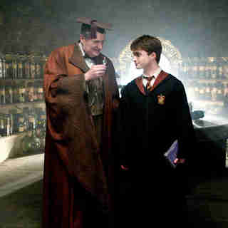 Jim Broadbent stars as Horace Slughorn and Daniel Radcliffe stars as Harry Potter in Warner Bros Pictures' Harry Potter and the Half-Blood Prince (2009)