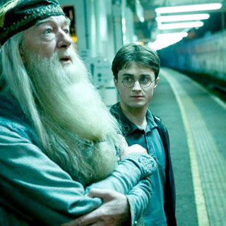 Michael Gambon stars as Albus Dumbledore  and Daniel Radcliffe stars as Harry Potter in Warner Bros Pictures' Harry Potter and the Half-Blood Prince (2009)