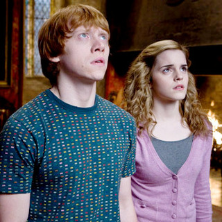 Rupert Grint stars as Ron Weasley and Emma Watson stars as Hermione Granger in Warner Bros Pictures' Harry Potter and the Half-Blood Prince (2009)