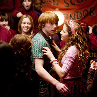 Rupert Grint stars as Ron Weasley and Jessie Cave stars as Lavender Brown in Warner Bros Pictures' Harry Potter and the Half-Blood Prince (2009)