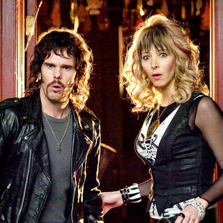Kevin Dillon stars as Carl Scudder and Lisa Kudrow stars as Lois Scudder in DreamWorks' Hotel for Dogs (2009)