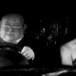 Laurence R. Harvey stars as Martin and Ashlynn Yennie stars as Miss Yennie in IFC Films' The Human Centipede II (Full Sequence) (2011)