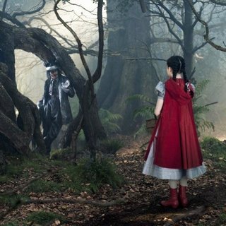 Johnny Depp stars as The Wolf and Lilla Crawford stars as Red Riding Hood in Walt Disney Pictures' Into the Woods (2014)