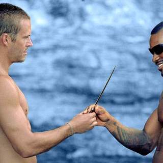 Paul Walker and Tyson Beckford in MGM's Into the Blue (2005)