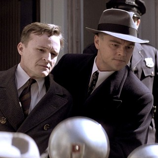 Damon Herriman stars as Bruno Hauptmann and Leonardo DiCaprio stars as J. Edgar Hoover in Warner Bros. Pictures' J. Edgar (2011)