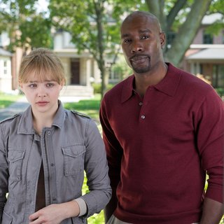 Chloe Moretz stars as Mindy Macready and Morris Chestnut stars as Sergeant Marcus Williams in Universal Pictures' Kick-Ass 2 (2013)