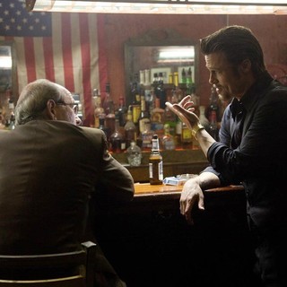 Richard Jenkins stars as Driver and Brad Pitt stars as Jackie Cogan in The Weinstein Company's Killing Them Softly (2012)