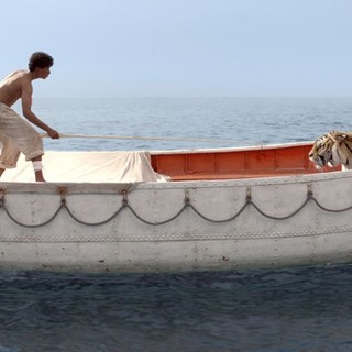Suraj Sharma stars as Pi Patel and Richard Parker the Tiger in The 20th Century Fox's Life of Pi (2012)