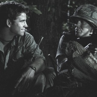 Liam Hemsworth stars as Mickey Wright and Austin Stowell stars as Dalton Joiner in IFC Films' Love and Honor (2013)