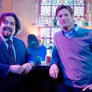Dan Fogler stars as Lane Marshall and Aaron Eckhart stars as Burke Ryan in Universal Pictures' Love Happens (2009)