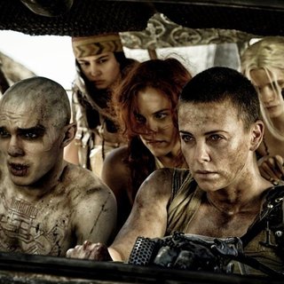 Nicholas Hoult, Rosie Huntington-Whiteley and Charlize Theron in Warner Bros. Pictures' Mad Max: Fury Road (2015). Photo credit by Jasin Boland.