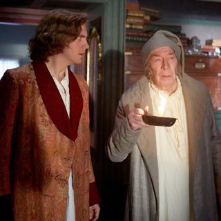 Dan Stevens stars as Charles Dickens and Christopher Plummer stars as Ebenezer Scrooge in Bleecker Street Media's The Man Who Invented Christmas (2017)