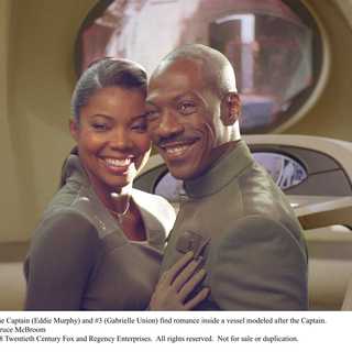 The Captain (Eddie Murphy) and #3 (Gabrielle Union) find romance inside a vessel modeled after the Captain. Photo Credit: Bruce McBroom.