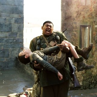 Matteo Sciabordi stars as Angelo Torancelli 'The Boy' and Omar Benson Miller stars as Private First Class Sam Train in Buena Vista Pictures' Miracle at St. Anna (2008)