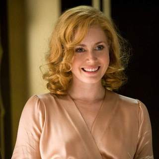 Amy Adams as Delysia Lafosse in Bharat Nalluri's MISS PETTIGREW LIVES FOR A DAY, a Focus Features release.