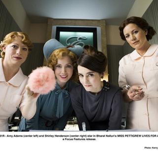 Amy Adams (center left) and Shirley Henderson (center right) star in Bharat Nalluri's MISS PETTIGREW LIVES FOR A DAY, a Focus Features release.