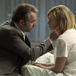 Jean Dujardin stars as Moise and Cecile de France stars as Alice in EuropaCorp's Mobius (2013)