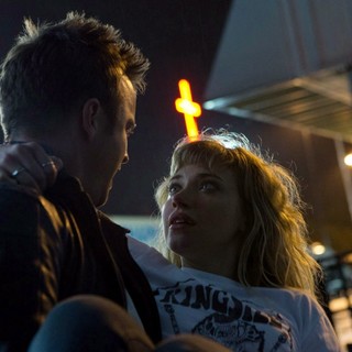 Aaron Paul stars as Tobey Marshall and Imogen Poots stars as Julia in Walt Disney Pictures' Need for Speed (2014)