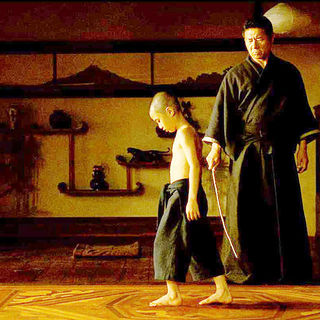 Yoon Sungwoong stars as Young Raizo and Sho Kosugi stars as Ozunu in Warner Bros Pictures' Ninja Assassin (2009)