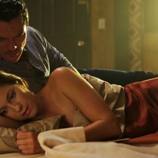 Luke Evans stars as Driver and Lindsey Shaw stars as Amber in Anchor Bay Films' No One Lives (2013)
