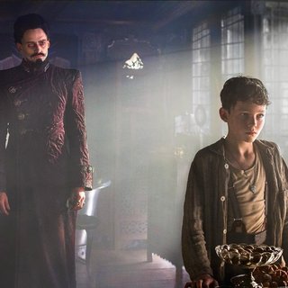 Hugh Jackman stars as Blackbeard and Levi Miller stars as Peter Pan in Warner Bros. Pictures' Pan (2015). Photo credit by Laurie Sparham.